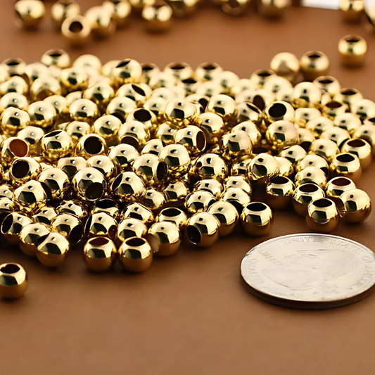 6mm Golden round beads - 50 gm